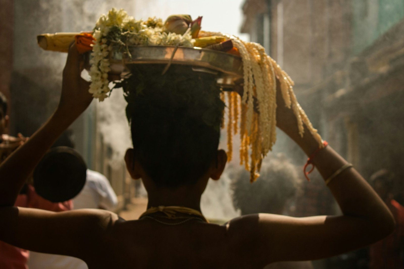 Vedic Hindu Sanskaras,a man carrying a bowl of food on his head
