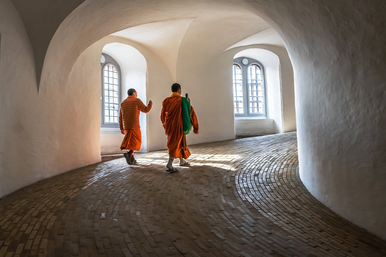 Law of attraction, monks, tourists, round tower-7502654.jpg