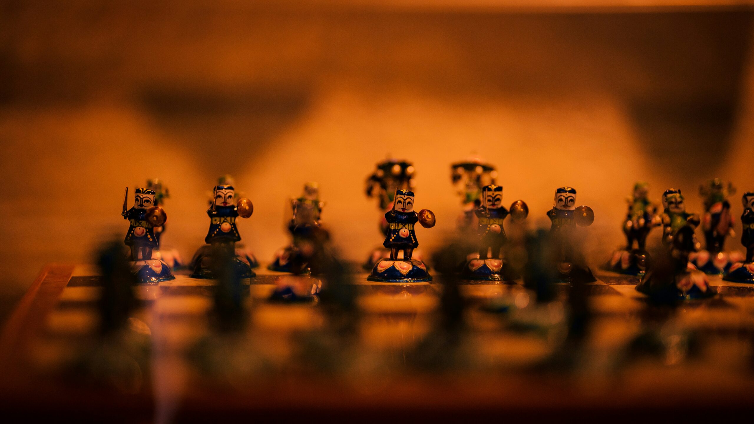 IQ, a group of toy figurines sitting on top of a wooden table