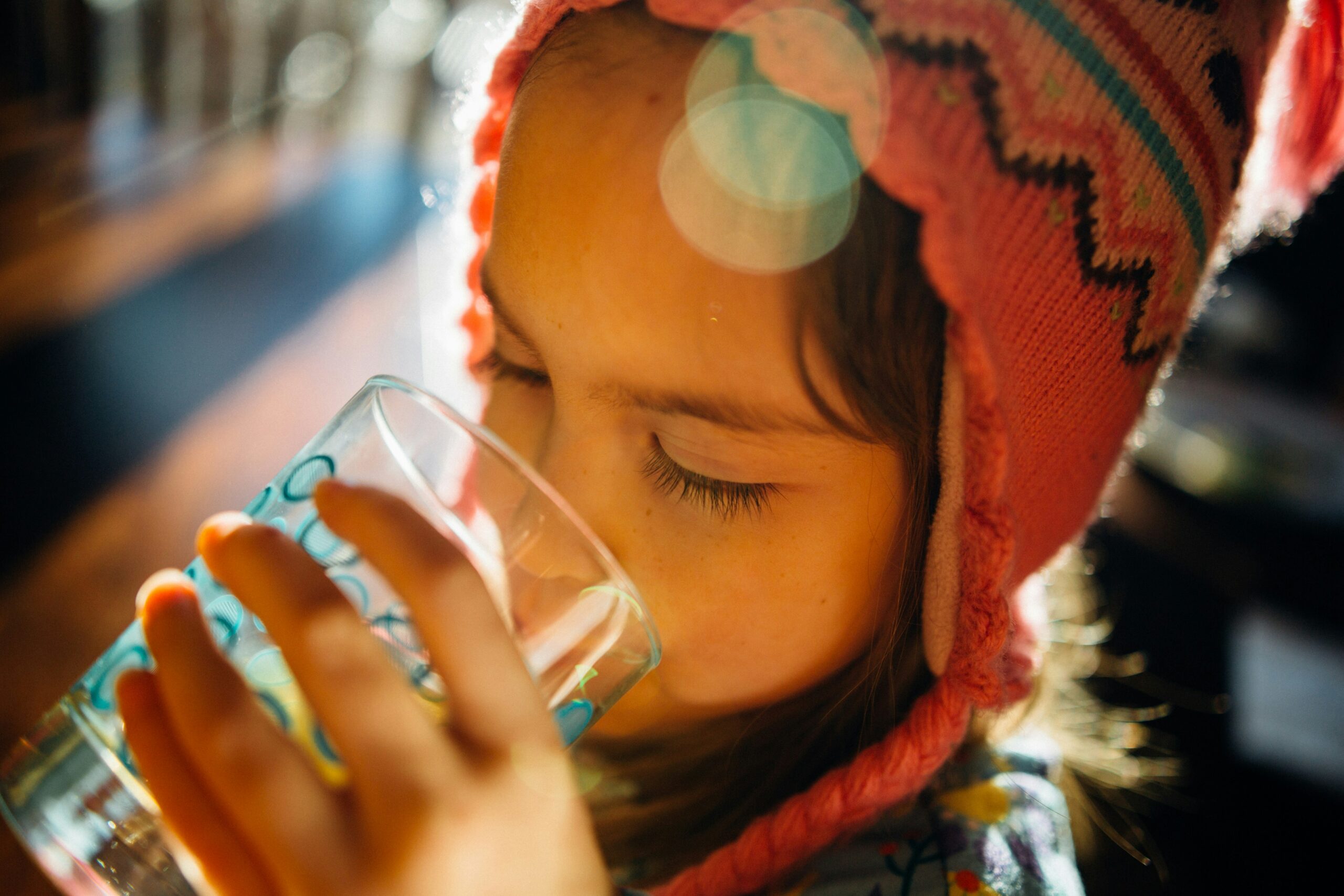 thirst craving, selective focus photography of girl drinking water